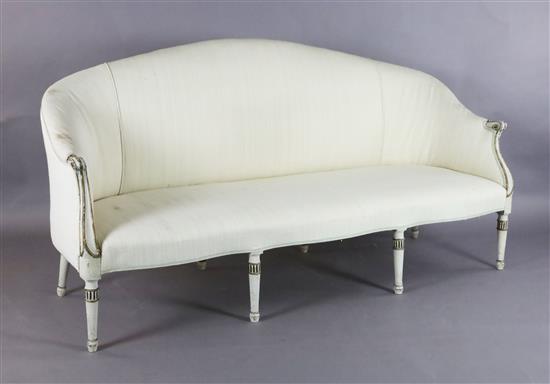 A George III parcel gilt white painted settee, W.6ft 2in. D.2ft 6in. H.3ft 3in.